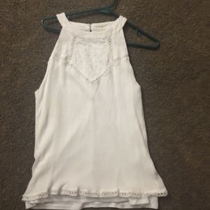 White sleeveless top